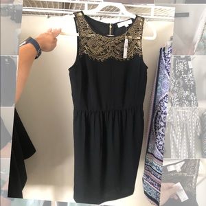 Black dress with gold